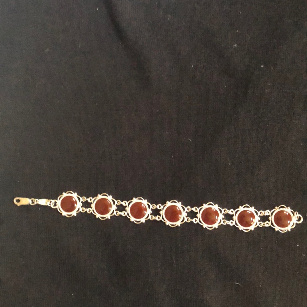 SS bracelet with red stones